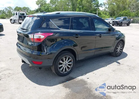 2017 Ford Escape Titanium z USA, uszkodzony, nr VIN 1FMCU0JD2HUF02415